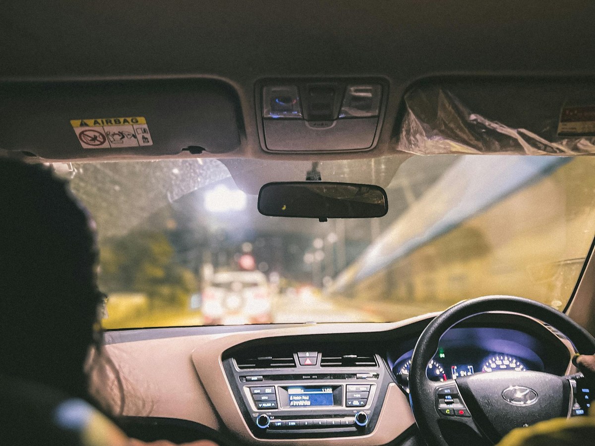 Night driving view from inside a car
