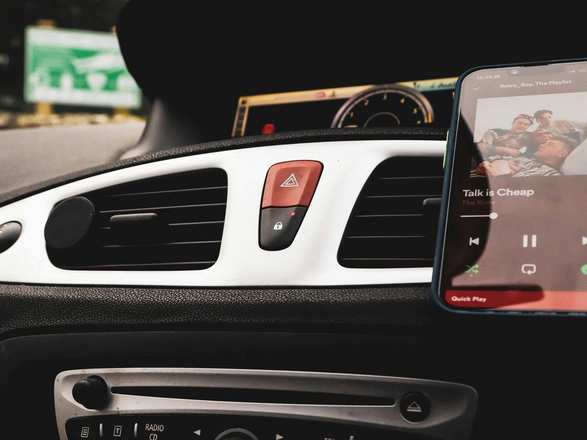 Phone mounted near a car dashboard